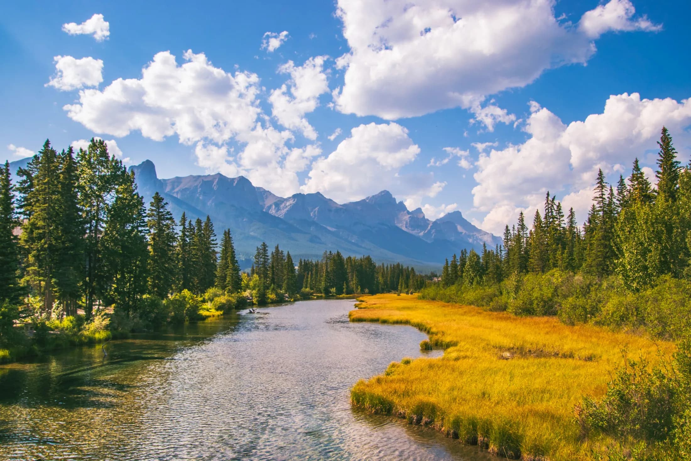 Mountain landscape beside a quiet river